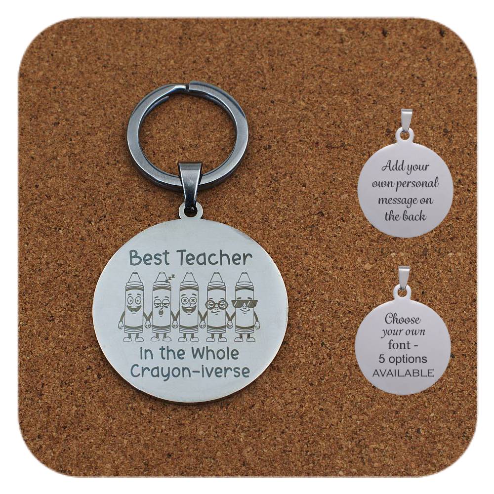 Keyring with 'Best Teacher in the Whole Crayon-iverse' design on a cork background