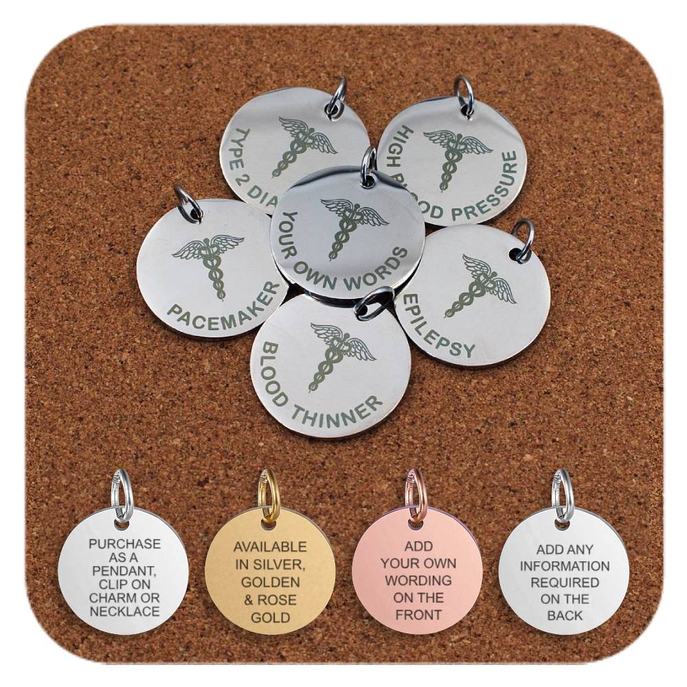Stainless steel medical alert pendants engraved with conditions like Type 2 Diabetes, High Blood Pressure, Pacemaker, Blood Thinner, Epilepsy, and a custom option. Four additional pendants at the bottom show engraved text that reads: pendant or charm use, metal finishes in silver, gold, and rose gold, and the ability to add personalized wording on the front and back.