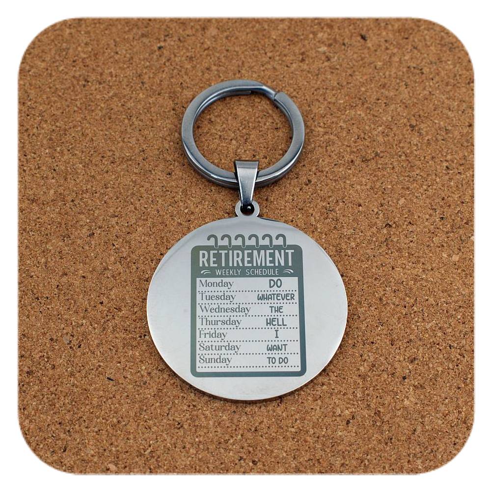 Keychain with 'Retirement' theme on a cork background