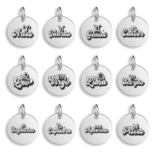 Silver pendants with different Zodiac Star Sign Words designs on a white background