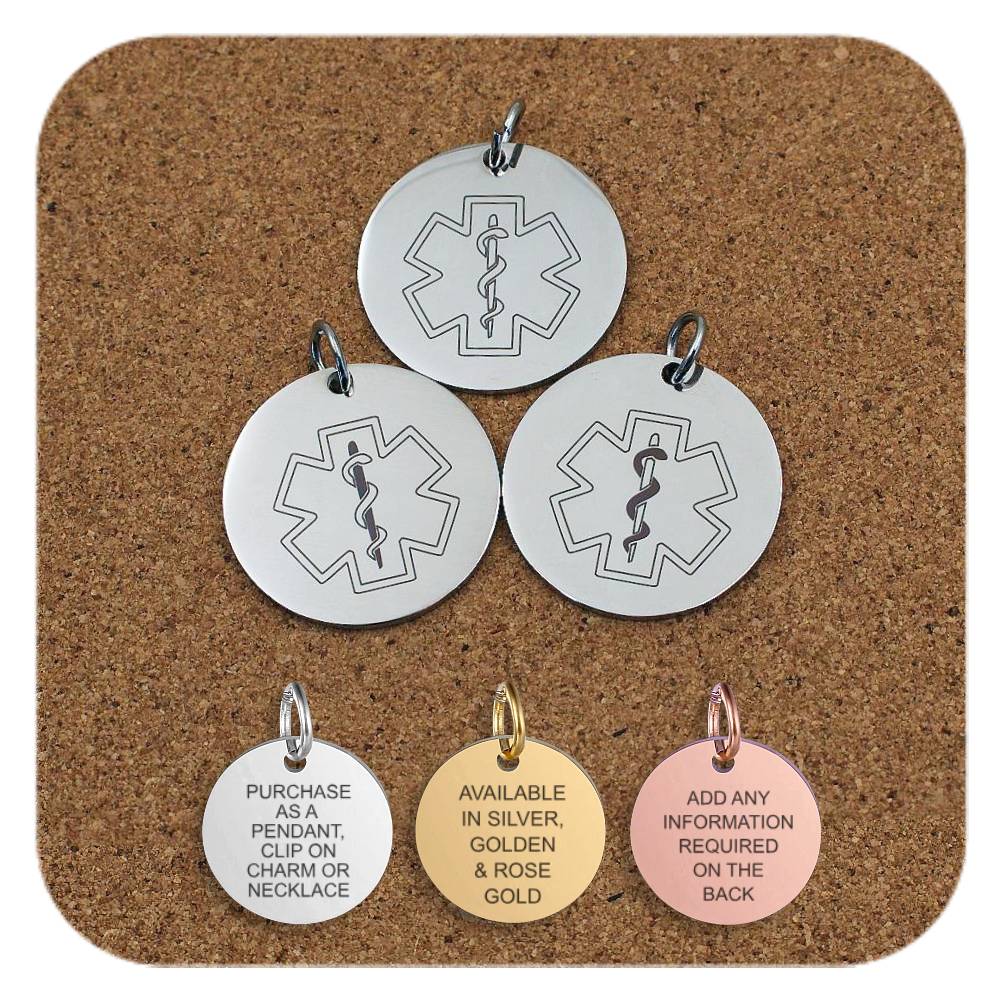 Three round medical alert pendants featuring the Star of Life symbol with a Rod of Asclepius, displayed on a corkboard. Below them are three smaller pendants in silver, gold, and rose gold finishes. The silver pendant reads 'Purchase as a pendant, clip on charm or necklace'; the gold pendant reads 'Available in silver, golden & rose gold'; and the rose gold pendant reads 'Add any information required on the back'.