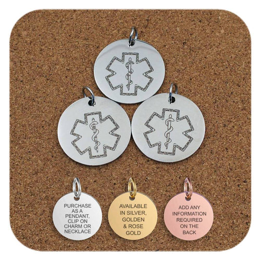 Three round medical alert pendants featuring the Star of Life symbol with a Rod of Asclepius, displayed on a corkboard. Below them are three smaller pendants in silver, gold, and rose gold finishes. The silver pendant reads 'Purchase as a pendant, clip on charm or necklace'; the gold pendant reads 'Available in silver, golden & rose gold'; and the rose gold pendant reads 'Add any information required on the back'.