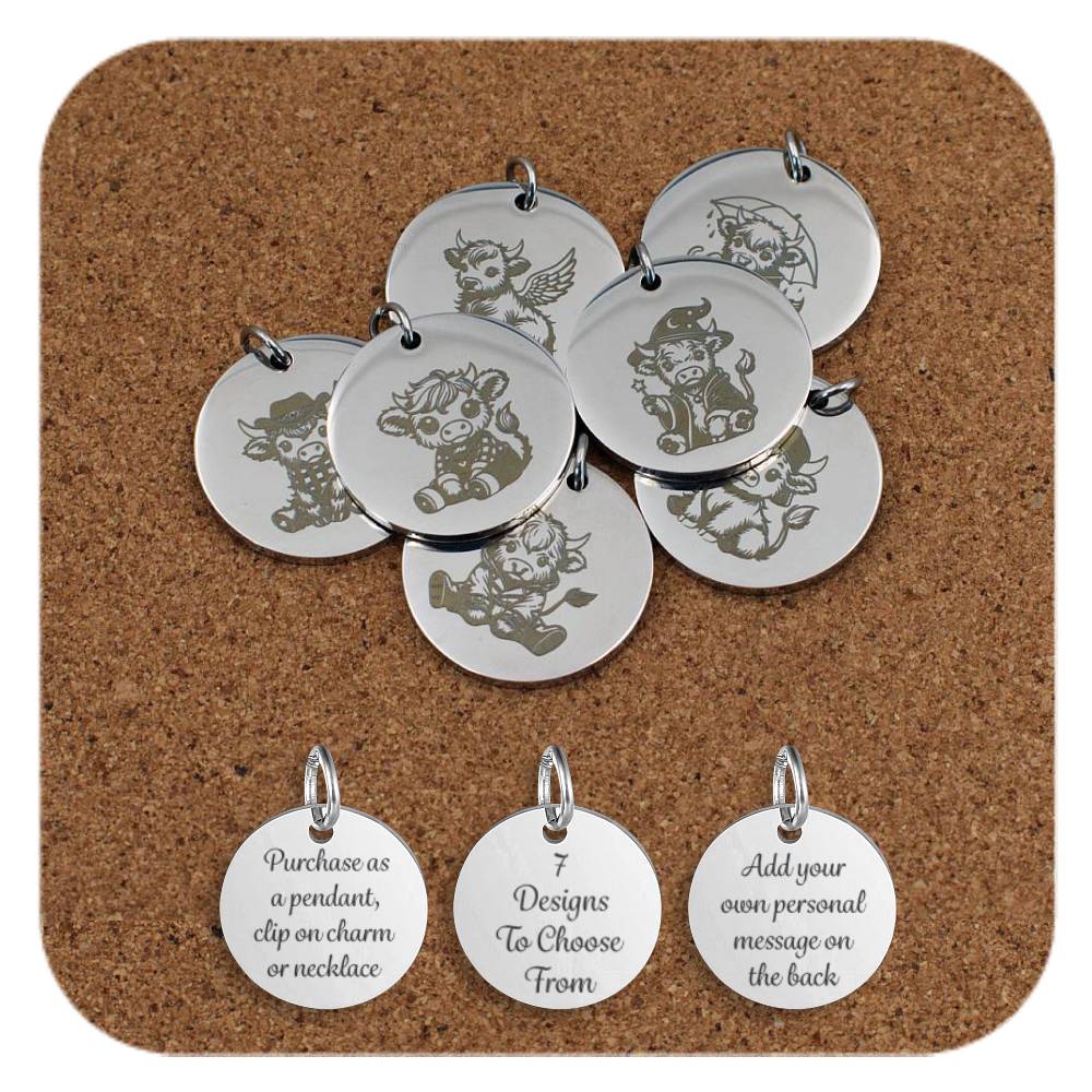 Collection of seven round silver pendants featuring engraved cartoon-style cow designs, displayed on a corkboard background. Three additional pendants at the bottom show engraved text that reads: 'Purchase as a pendant, clip on charm or necklace,' '7 Designs To Choose From,' and 'Add your own personal message on the back