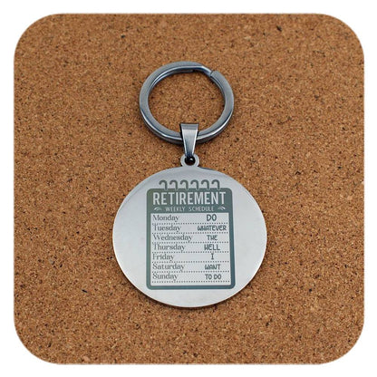 Keychain with 'Retirement' theme on a cork background