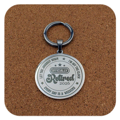 Silver keyring with Retired 2026 Every Day Is A Weekend design on cork background