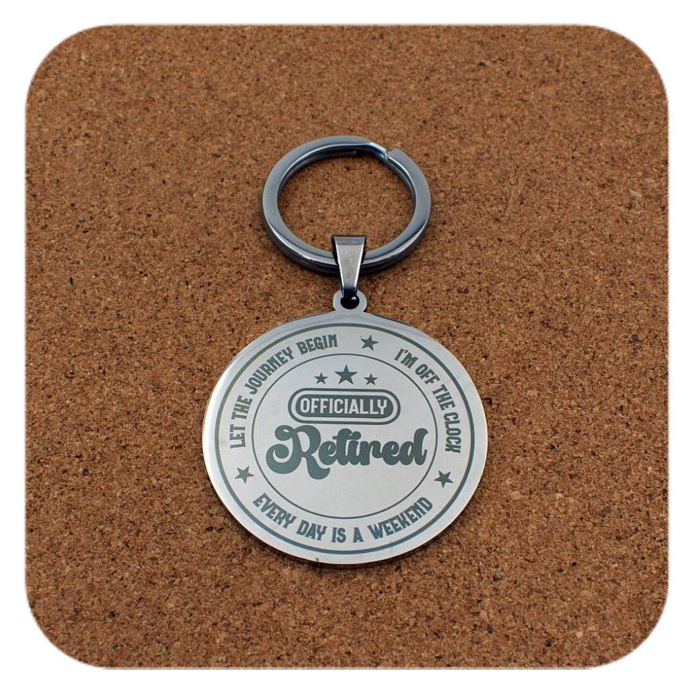 Silver keyring with Retired Every Day Is A Weekend design on cork 