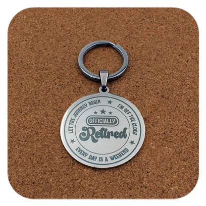 Silver keyring with Retired Every Day Is A Weekend design on cork 