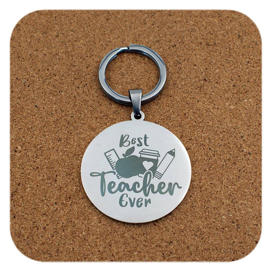 Silver keyring with Best Teacher Ever design on cork background