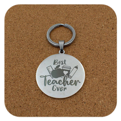 Silver keyring with Best Teacher Ever design on cork background