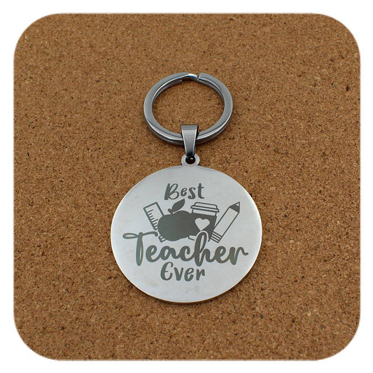 Silver keyring with Best Teacher Ever design on cork background