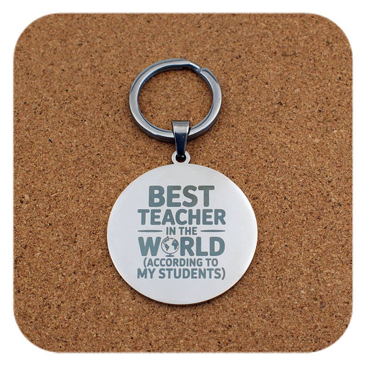 Silver keyring with Best Teacher In The World design on cork background