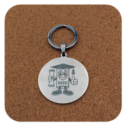 Silver keyring with Novelty Graduation Diploma 2025 design on cork background