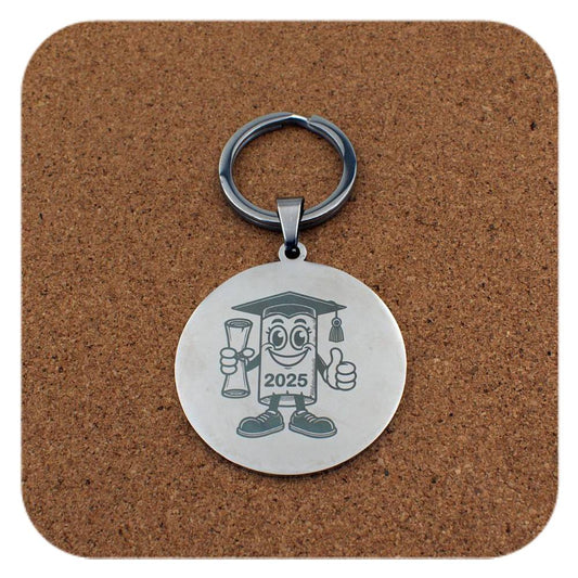 Silver keyring with Novelty Graduation Diploma 2025 design on cork background