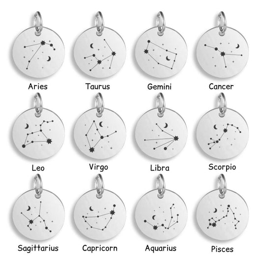 Silver pendants with different Celestial Star Sign designs on a white background