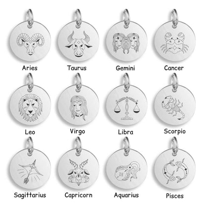 Silver pendants with different Zodiac Star Sign designs on a white background