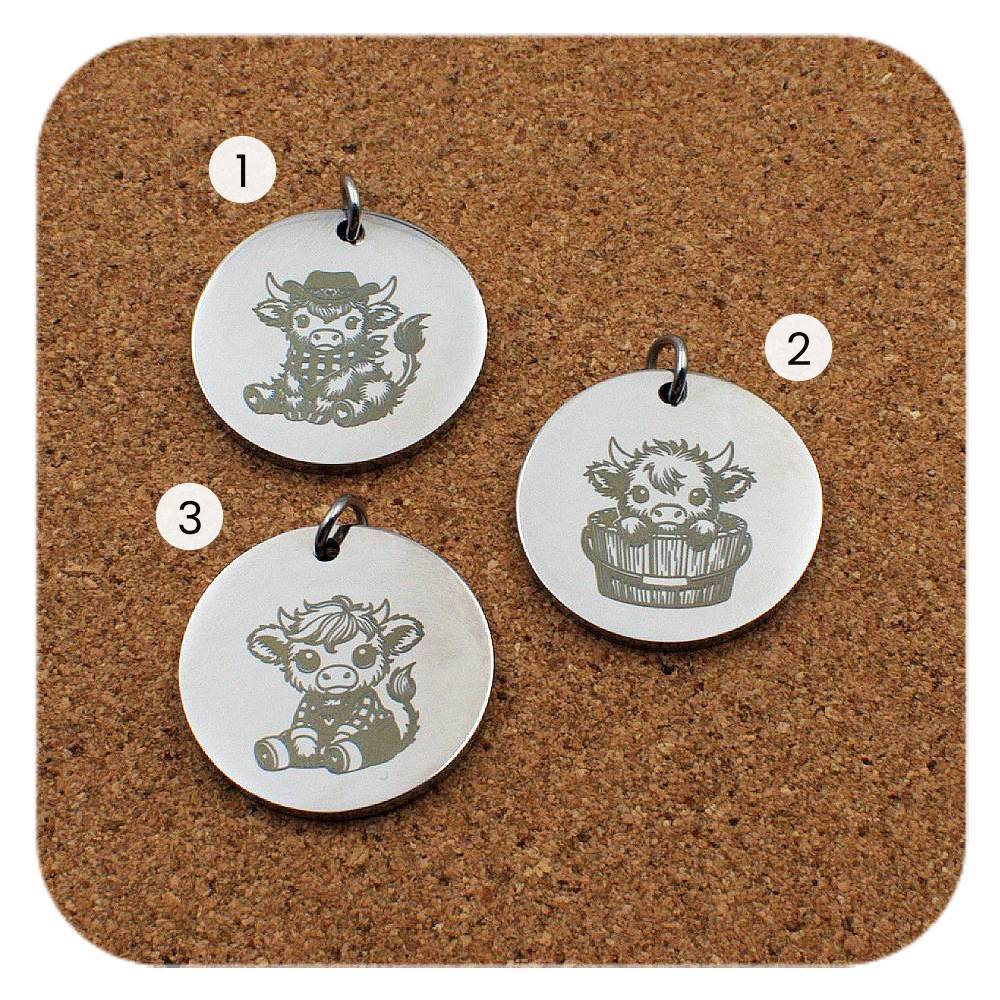 Engraved Highland Cow stainless steel pendant in three designs: cowboy hat, barrel tub and dungarees 