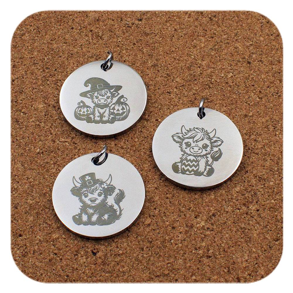 Engraved Highland Cow stainless steel pendant in three designs: Halloween, Easter and St Patrick’s