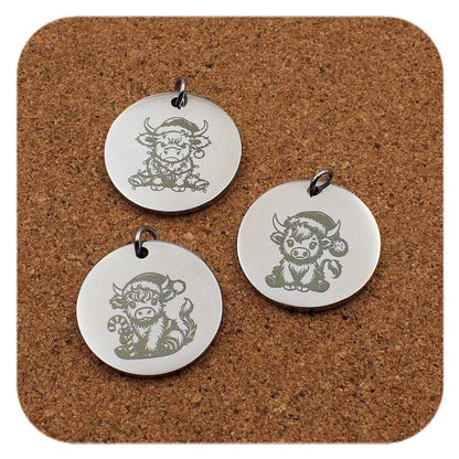 Engraved Highland Cow stainless steel pendant in three designs: Christmas lights, Christmas hat and candy cane
