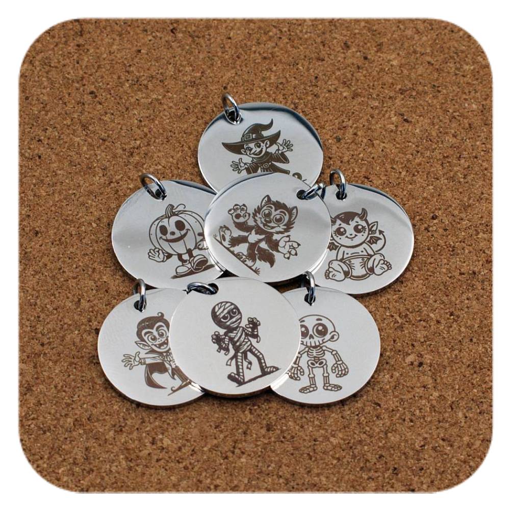 Silver pendants with different Spooky Halloween designs on cork background