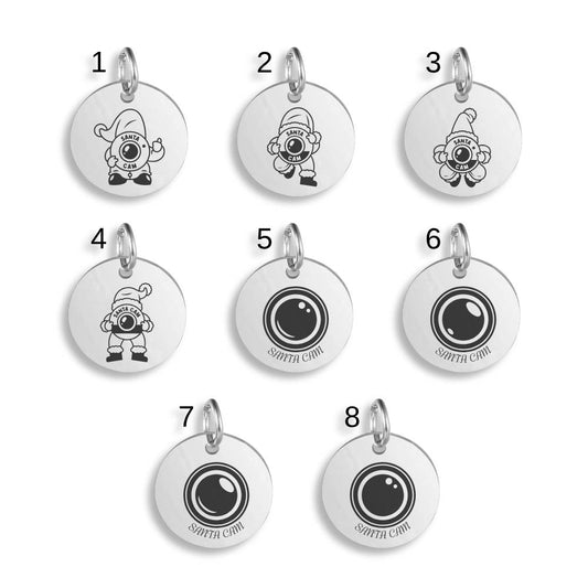 Silver pendants with different North Pole Santa Cam designs on a white background