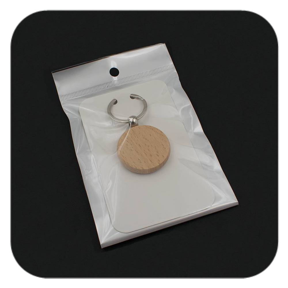 Example packaging for Celtic Tree Zodiac wooden keyring on display card in clear bag