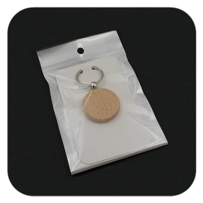 Example packaging for Celtic Tree Zodiac wooden keyring on display card in clear bag