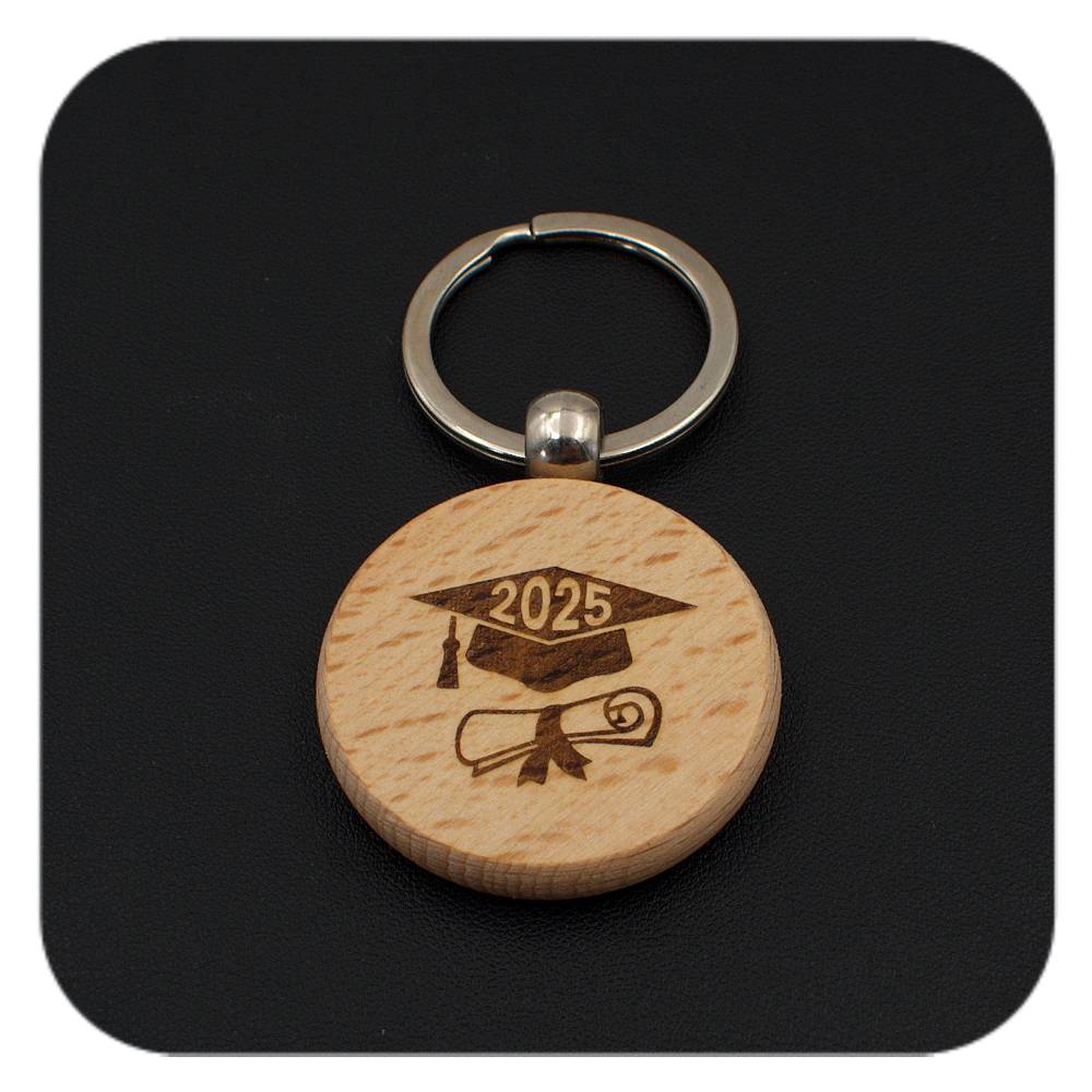 Wooden keyring with Graduation Cap Diploma 2025 design on black background