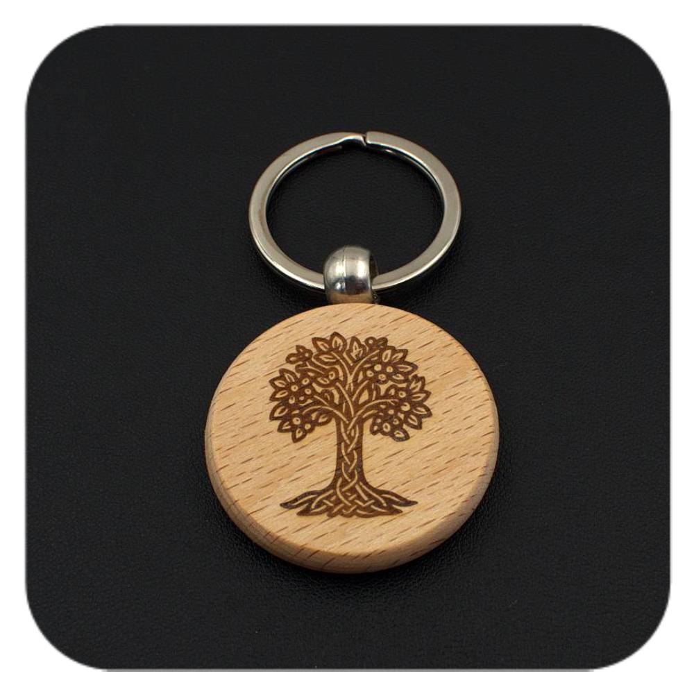 Wooden keyring with Hazel Celtic Tree Zodiac design on black background