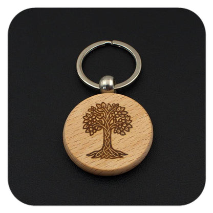 Wooden keyring with Hazel Celtic Tree Zodiac design on black background