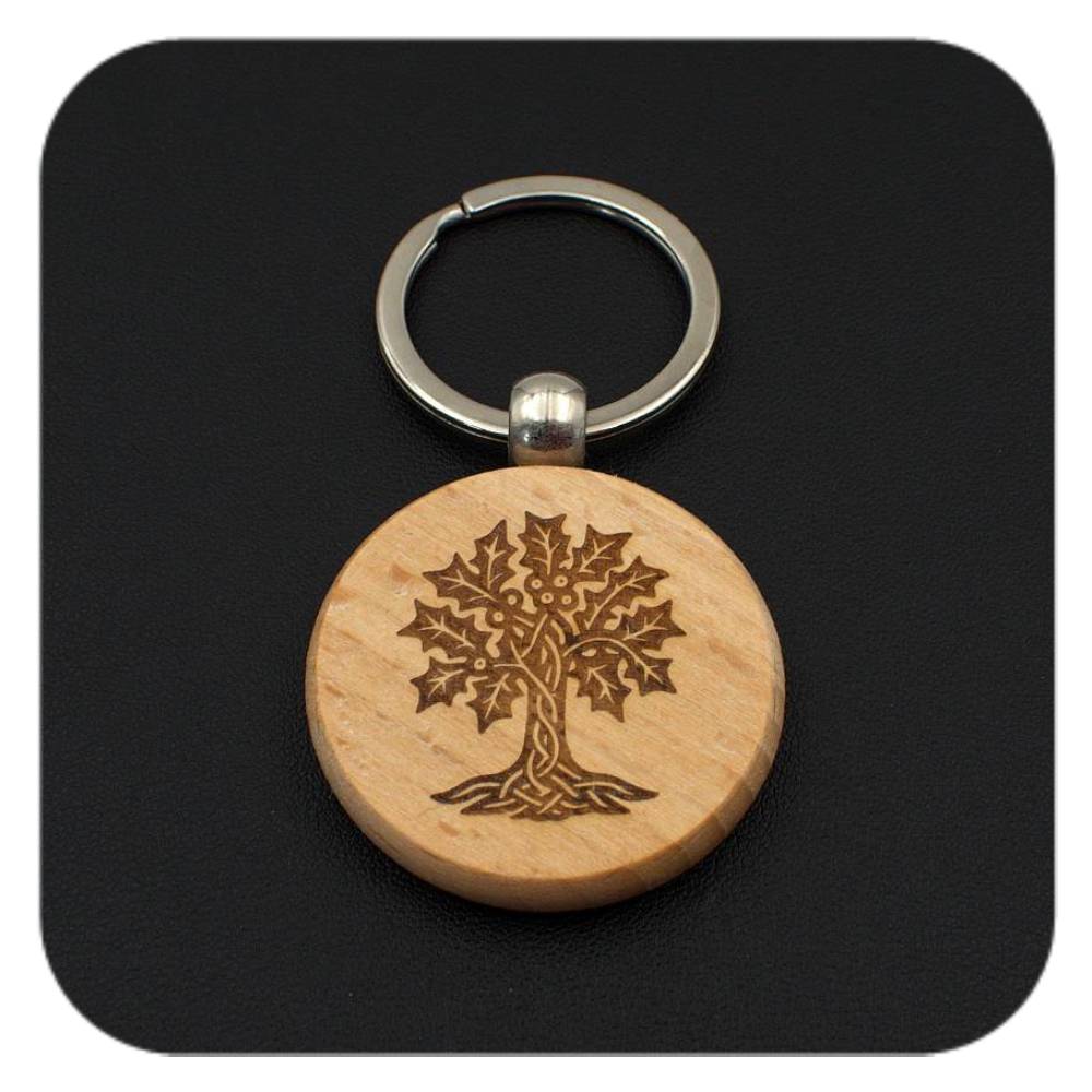 Wooden keyring with Holly Celtic Tree Zodiac design on black background